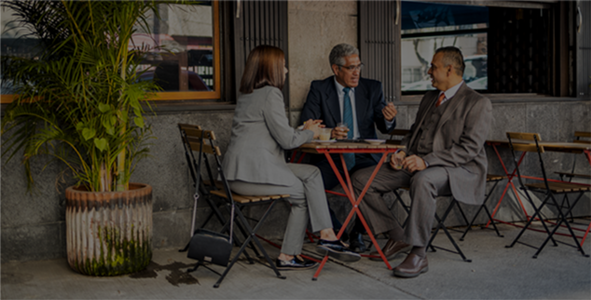 Business people at an outdoor table